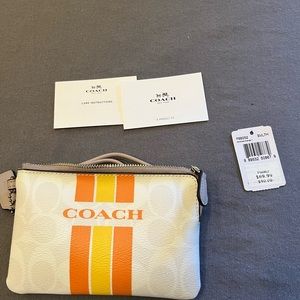Brand new with tags - coach wristlet.